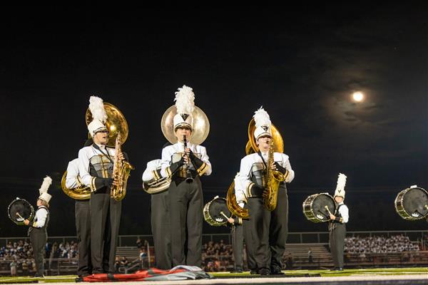 Fairview High marching band members perform